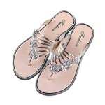 Tongs femme - marque - mod�le - or - plage - antid�rapant