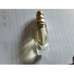 Miniature eau de toilette escada en fleurs.