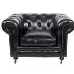 Fauteuil noir en cuir chesterfield chicago vintage