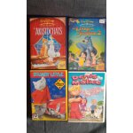 Lot de 4 dvd enfant. aristochats . le livre de la jungle 2. stuart little. denis la malice