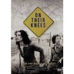 On their knees