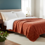 Couverture flanelle embosse terracotta feuilles dores 220x240 cm - mt - mondial tissus