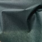 Intiss spun dperlant et rsistant aspect tissu uni vert sapin 160cm - mondial tissus