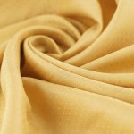 Tissu batiste aloe vera jaune moutarde - mondial tissus