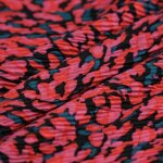 Tissu jersey polyester pliss tache psych rose - mondial tissus