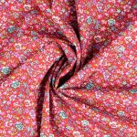 Tissu popeline de coton fleuri sur fond rouge - mondial tissus