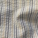 Tissu seersucker rayures blanc cass� et bleu jean - domotex - mondial tissus