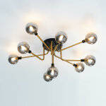 Plafonnier moderne noir et dor� 9 boules en verre ambr� - merano