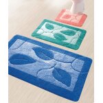 Tapis de bain motif feuilles.