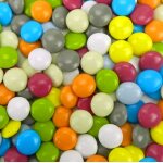 Destockage, sachet de 90g de mini confettis brillants multicolores au chocolat Destockage, sachet de 90g de mini confettis brillants multicolores au chocolat