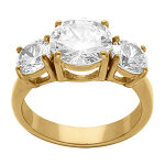 Bague en acier dor� trois oxydes oxydes blancs sertis