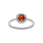 Bague en argent rhodié avec ambre véritable ronde contour orné d'oxydes blancs Bague en argent rhodié avec ambre véritable ronde contour orné d'oxydes blancs