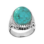 Bague en argent rhodié anneau ciselé orné d'une turquoise de synthèse Bague en argent rhodié anneau ciselé orné d'une turquoise de synthèse