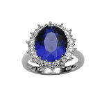 Bague en argent rhodi collection joaillerie orne d'un oxyde bleu au centre entour de petits oxydes ...