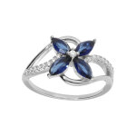 Bague en argent rhodié croisée d'oxydes blancs serti et fleur verre bleu foncé Bague en argent rhodié croisée d'oxydes blancs serti et fleur verre bleu foncé