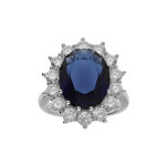 Bague en argent rhodié grosse 20mm x 17 mm avec la pierre centrale bleu foncé et contour pierres blanches ... Bague en argent rhodié grosse 20mm x 17 mm avec la pierre centrale bleu foncé et contour pierres blanches ...