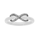 Bague en cramique blanche avec gros infini ajour en argent rhodi et oxydes blancs sertis