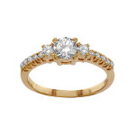 Bague en plaqu or gros oxyde blanc au centre, 2 plus petits sur les cts et remi - rail de petits oxydes ...