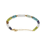 Bracelet en acier rondelles sodalite, olivine, quartz, oeil de tigre v�ritable et turquoise imitation ...