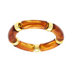 Bracelet extensible couleur ambre � anneaux dor�s
