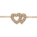 Bracelet en plaqu or chane avec au milieu 2 coeurs superposs vids et orns d'oxydes blancs sertis ...