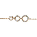Bracelet en plaqu or chane avec au milieu 3 anneaux de taille diffrente orns d'oxydes blancs sertis ...