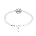 Bracelet stella mia en acier fleur de lotus rsine et nacre boules blanches - 16 + 3cm