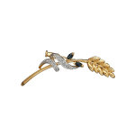 Broche en plaqu or branche courbe avec pi de bl et rubant enroul orn d'oxydes blancs et 2 oxydes ...