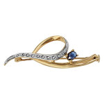 Broche en plaqu or ruban enroul avec 1 extrmit orne d'oxydes blancs et 1 oxydes bleu fonc ovale ...