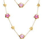Collier en acier dor� sautoir pastilles fleur et oxydes forme fleur rose clair