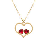 Collier en argent dor� avec pendentif coeur ajour� et deux oxydes rouges - 40 + 5cm