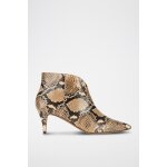 Bottines en cuir beige et noir