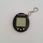 Tamagotchi noir bandai wiz 2004