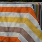 Nappe enduite rayure jaune - ovale 160x200cm fleur de soleil