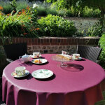 Nappe enduite unie prune - ovale 160x240cm fleur de soleil Nappe enduite unie prune - ovale 160x240cm fleur de soleil