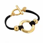 Bracelet de créateur pour femme, cuir noir et plaqué or - cercle griffé Bracelet de créateur pour femme, cuir noir et plaqué or - cercle griffé