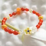 Bracelet girasole - acier argent et perles de murano jaune & orange