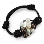 Bracelet tendance, cordons de cuir noir, or bicolore 18 carats, perles de culture, diamant - capella Bracelet tendance, cordons de cuir noir, or bicolore 18 carats, perles de culture, diamant - capella