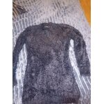 Vend 2 pulls de couleur noir et l'autre vert bleut�