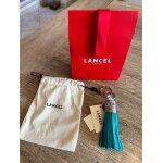 Bijou de sac pompon & porte - cl lancel