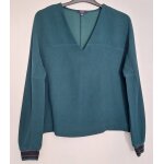 Blouse couleur unie avec col en v