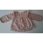 Blouse doubl�e toute fleurie boutonn�e au dos