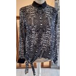 Superbe blouse noire et blanche boutonn�e au dos