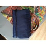 Bonjour je s un sac de voyage longchamp extensible juste ouvert pour voir