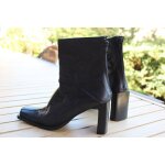 Bottines san marina en cuir violet / noir. fermeture zippe derrire taille tiquete:36.