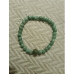 Bracelet �lastique artisanal en pierres vert.
