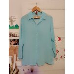 Chemise bleue claire translucide 44 xxl blanche porte.