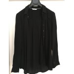 Chemise longue et large noire en viscose Chemise longue et large noire en viscose