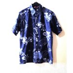 Chemise tommy hilfiger taille m tons bleu et blanc avec motifs tbe