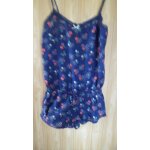 Combishort undiz. taille s. taille lastique, fines bretelles. petite fente sur les cts. longueur totale ...